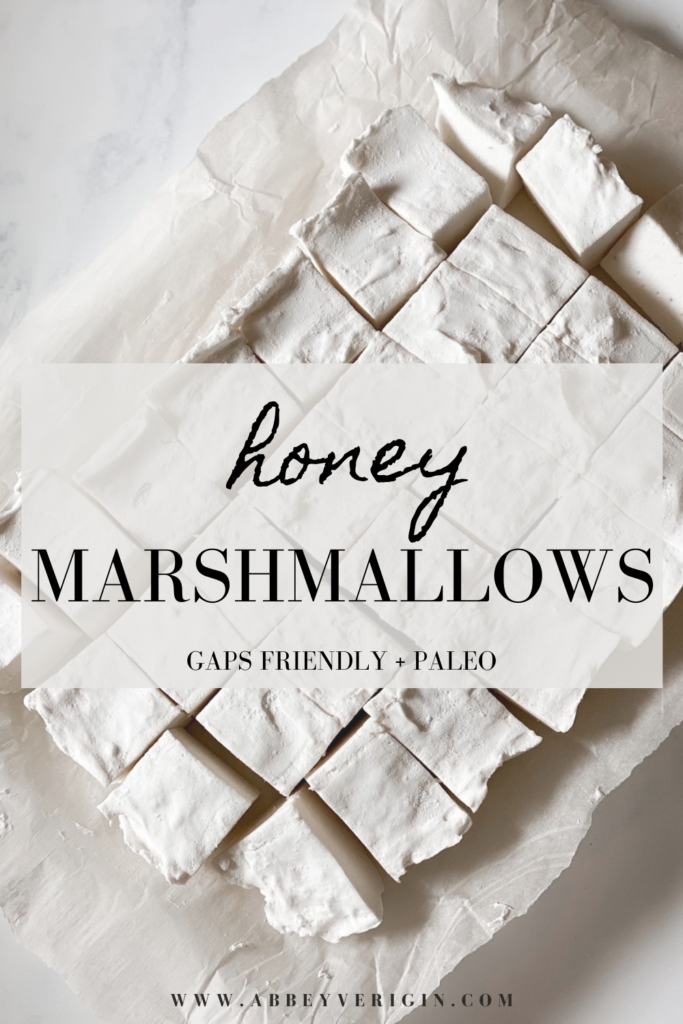 pinterest graphic with text overlay honey marshmallows sliced marshmallows on parchment paper