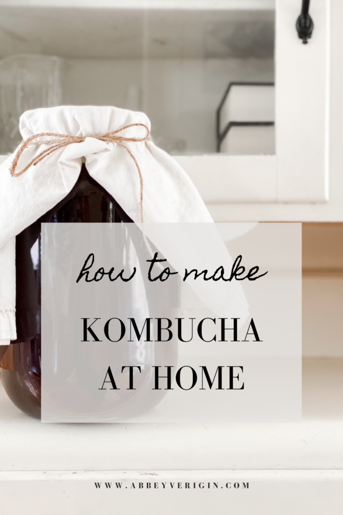 pinterest graphic gallon sized jar of homemade kombucha brewing on a hutch